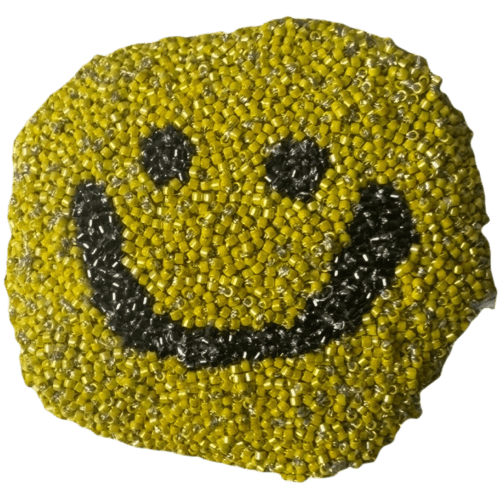 Yellow smiley beaded stone